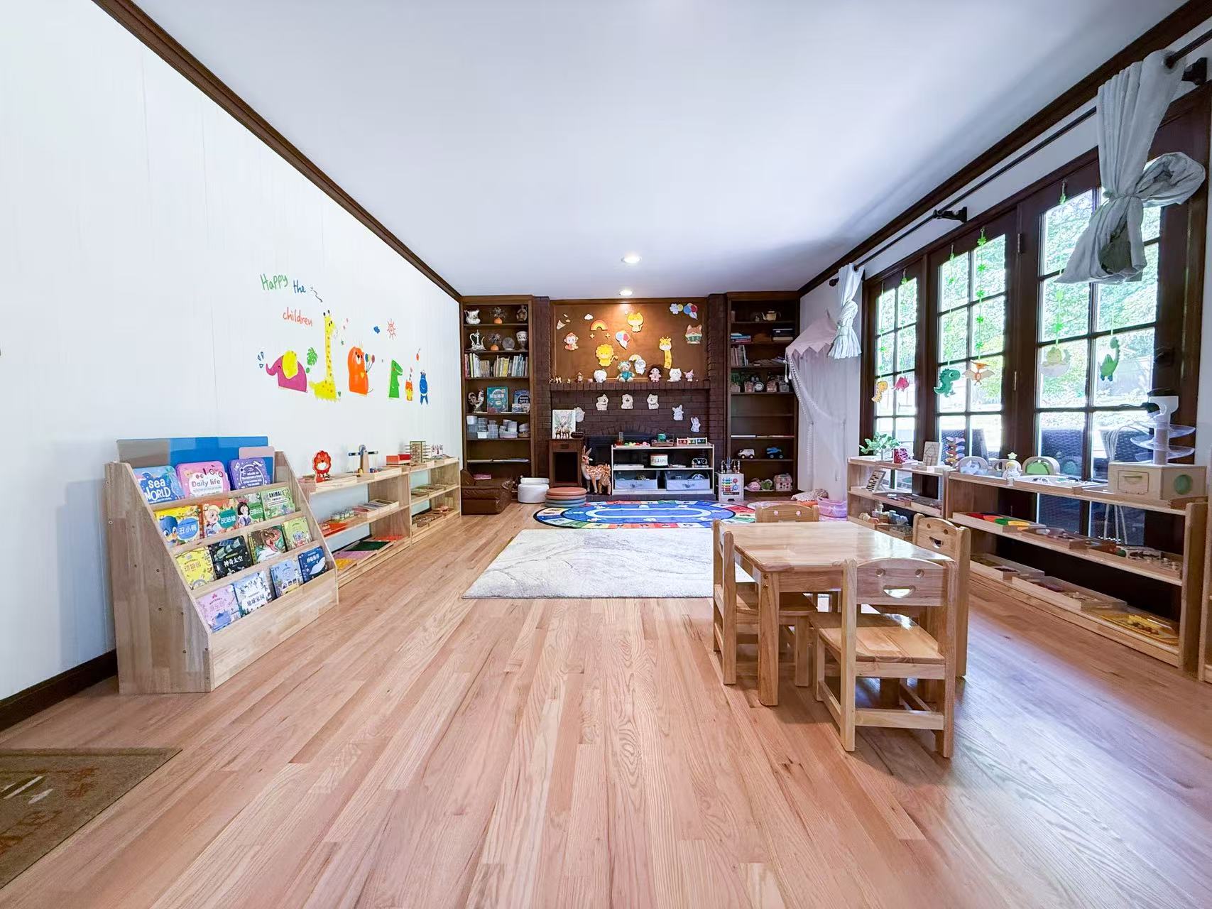 Lily's bright indoor learning space with child-sized wooden furniture